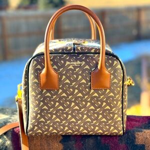 Burberry monogramed bowling purse.